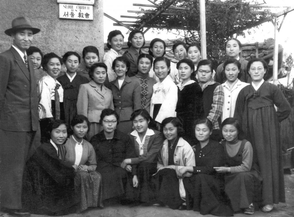 Father in front of the church with some of the professors who resigned and students who had been dismissed from Ewha University