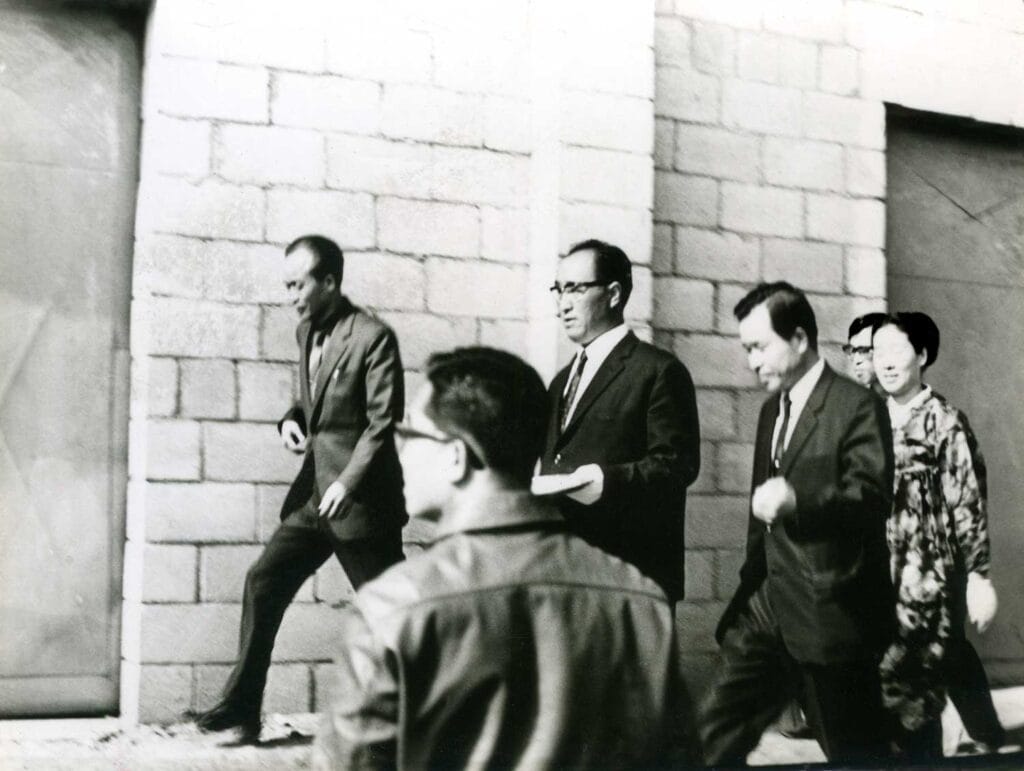 True Father with church officials at a factory operated by our church members, January 11, 1969