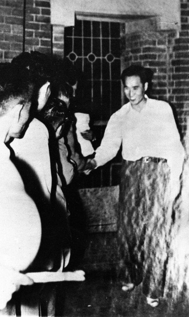 Father was acquitted and released from prison on October 4. Here, members welcome him back to freedom.