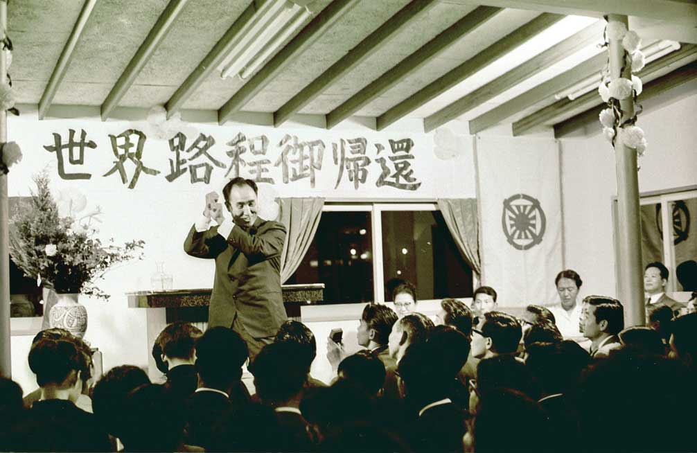 Father speaking to the members in Japan