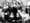 Mother (center, standing)